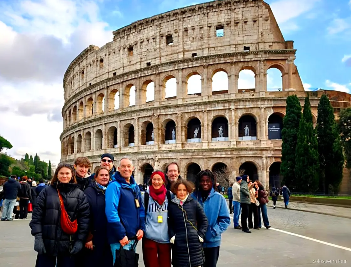 Golden-hour view over the Colosseum arena on the sunset tour