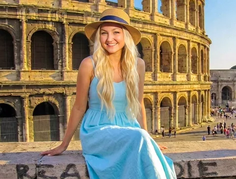 Colosseum timed entry ticket audio guide visitor exploring the amphitheater